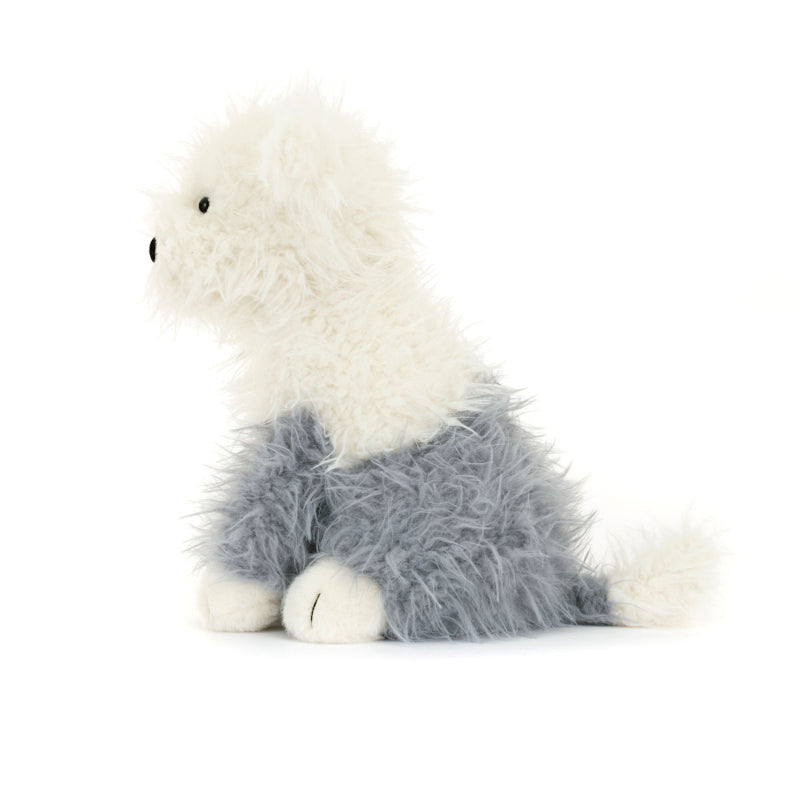 Hvid og grå hunde bamse med pjusket pels.