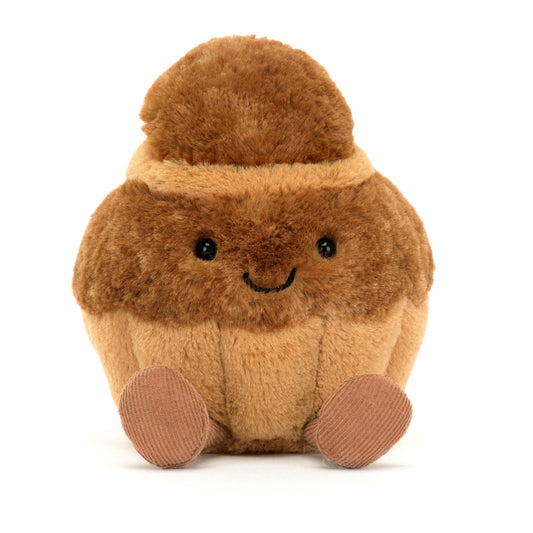 Jellycat bamse formet som en brioche kage med det sødeste smil.