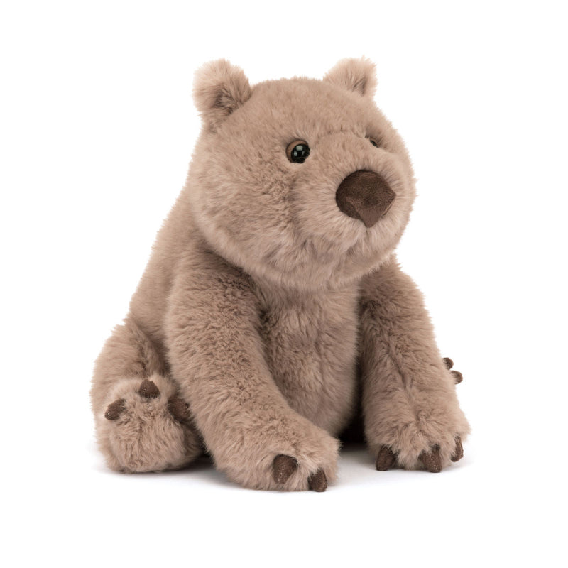 Nuttet Wombat fra Jellycat med et roligt udtryk.