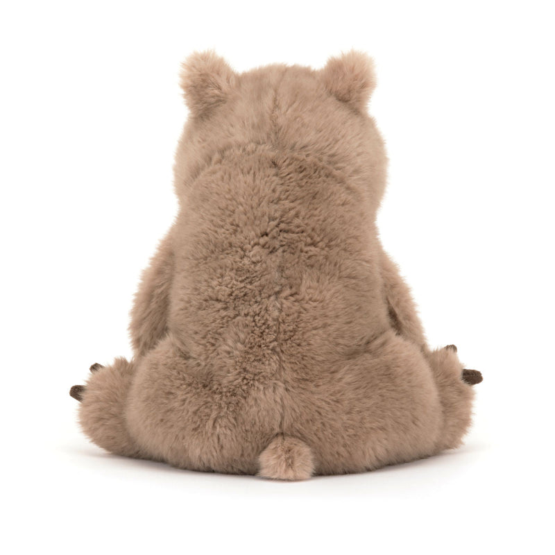 Nuttet Wombat fra Jellycat med et roligt udtryk.