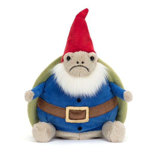 Jellycat bamse, som er en småsur skildpadde iført en mørkeblå trøje og brun bælte, som sidder under hans grønne skjold. Med sin røde nissehue og bløde, cremefarvede skæg er Timmy den mest gnavne nisse i byen.