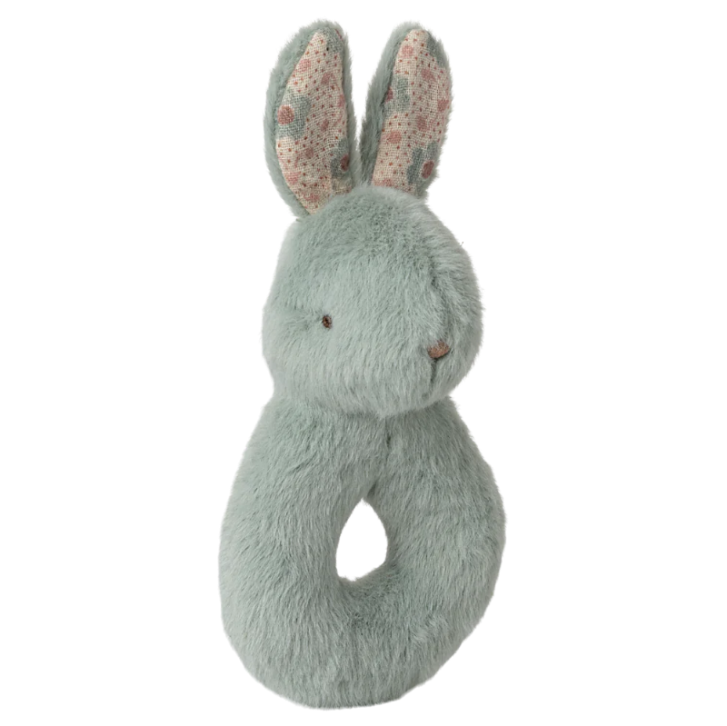 Gaveæske med mintgrøn hare-rangle og en blomstret stofble.