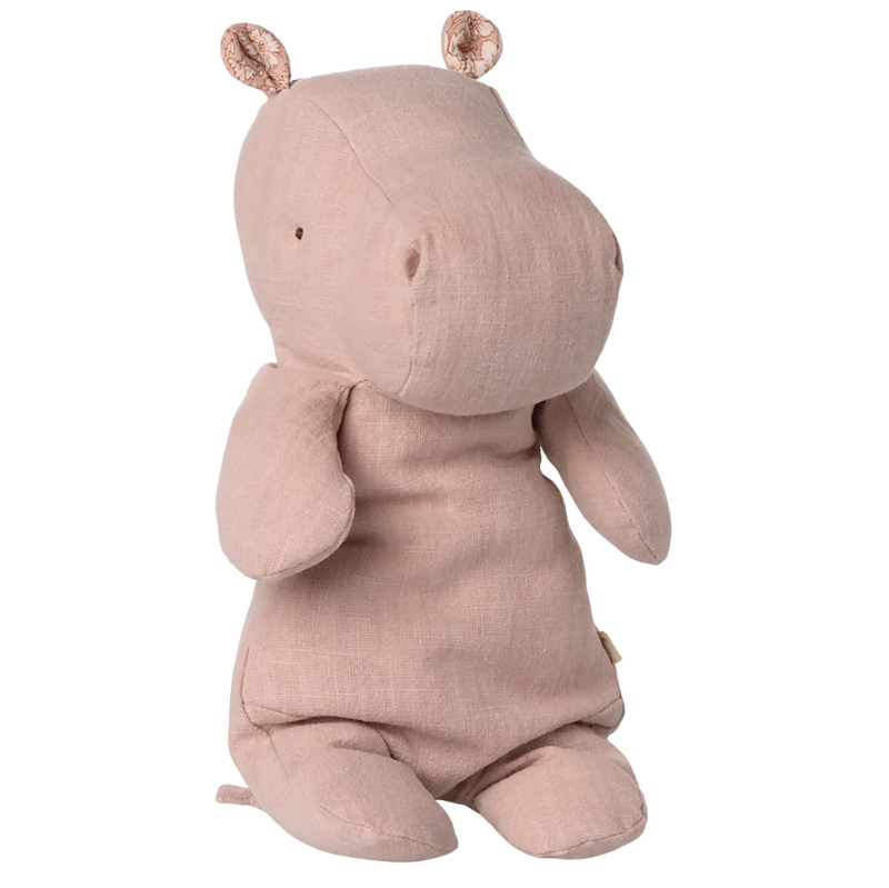 Lyserød blodhest bamse med blomsterprint i ørerne.