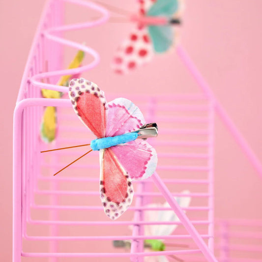 Orange og pink sommerfugl med klips.
