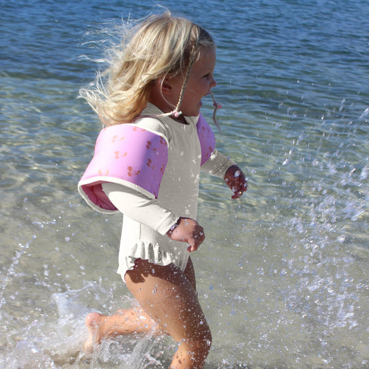 Svømmevinger med kirsebær mønster.