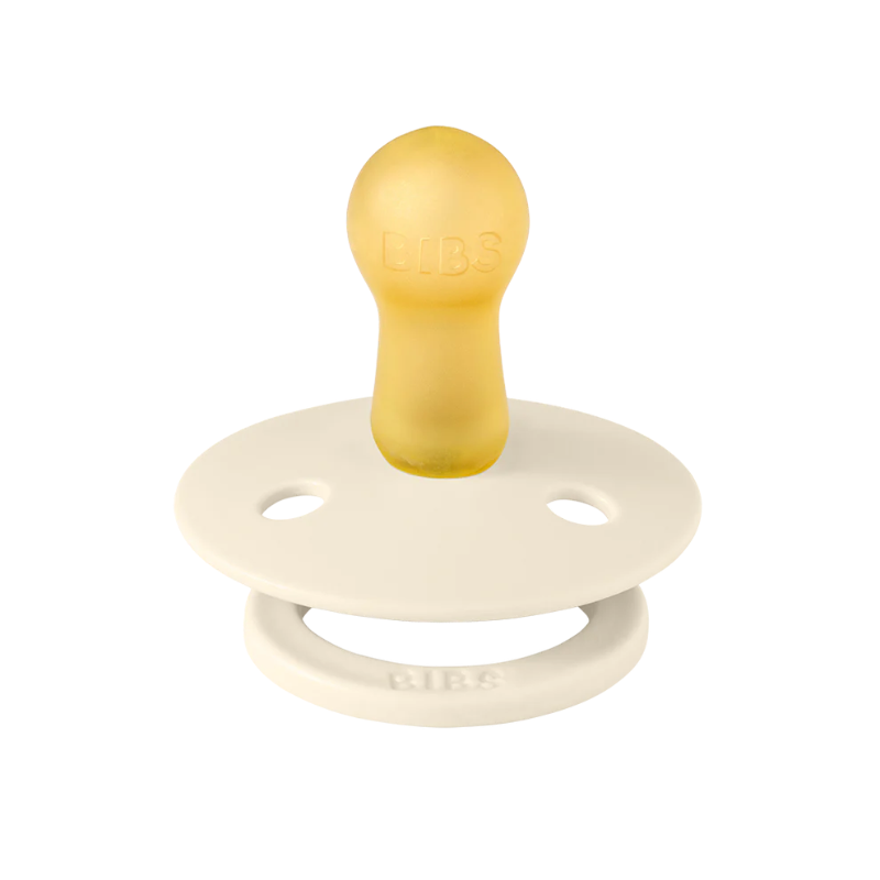 2 pakke med sutter i beige og lyserød.