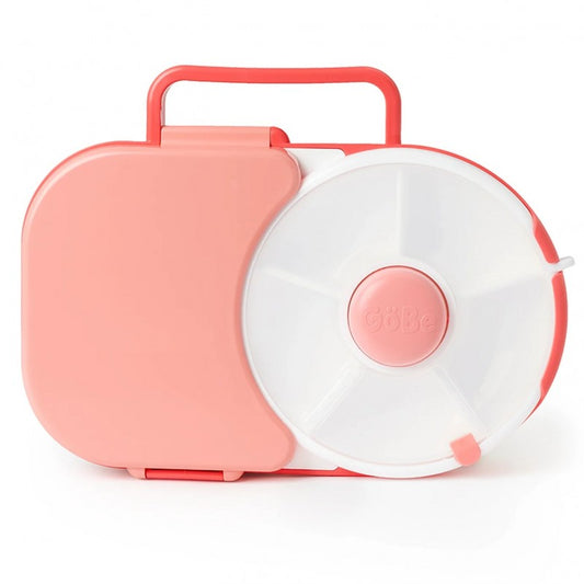 Madkasse med snack spinner i lyserød.