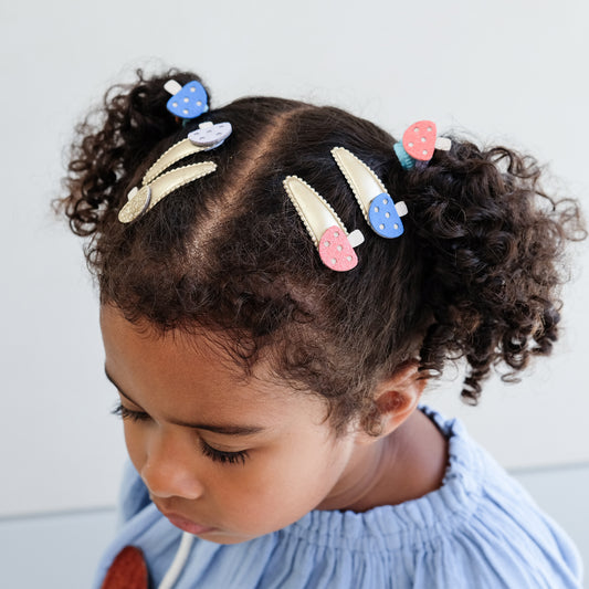 Hårspænder med svampe på.