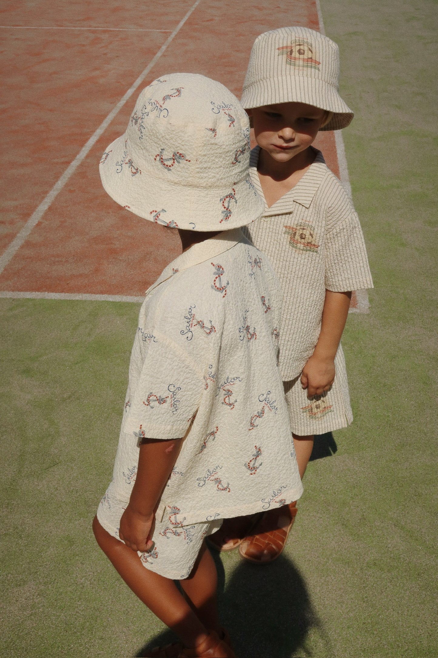 Konges Sløjd Elliot bøllehat, Stripe bluie - 12-18mdr.