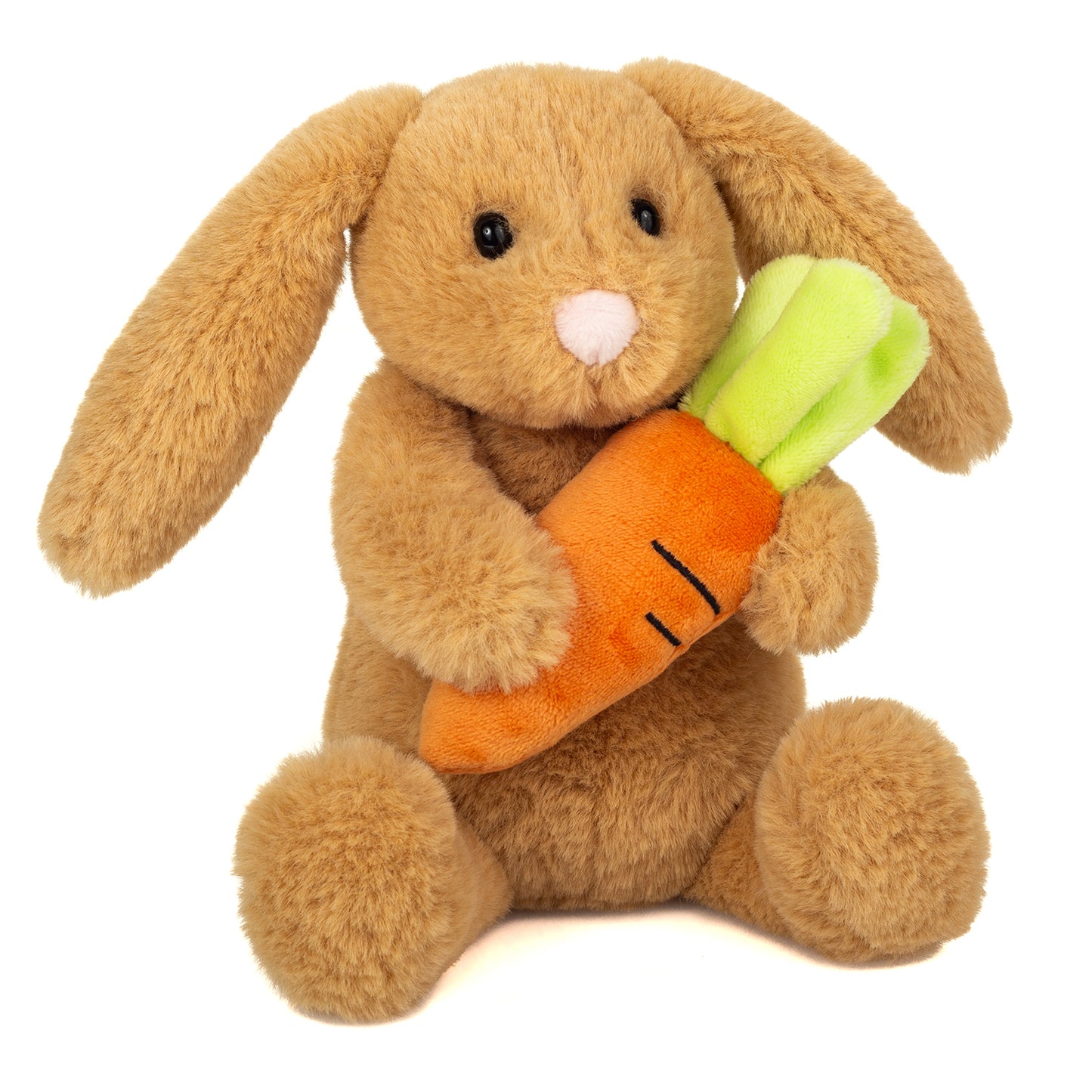 Brun kanin bamse, som holder en gulerod.