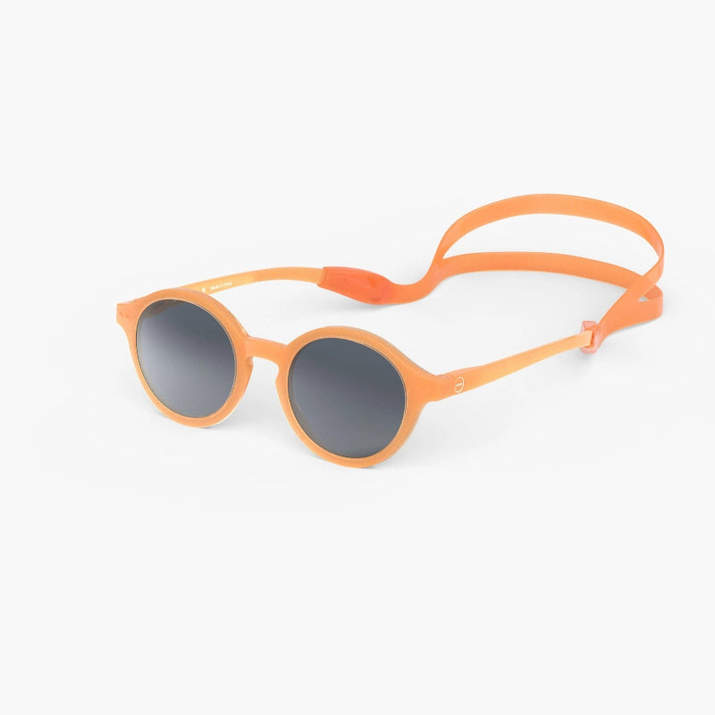Orange solbriller til børn.