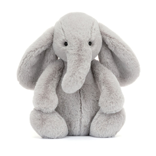 Grå bamse elefant med store runde ører og snabel. 