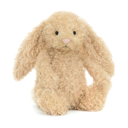 Krøllet cremefarvet kaninbamse.