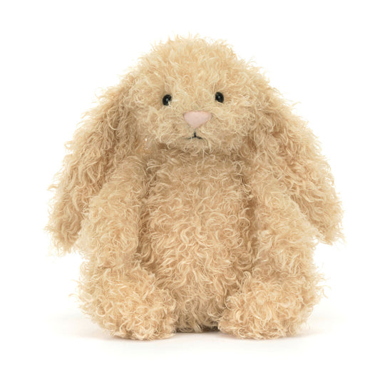 Krøllet cremefarvet kaninbamse.