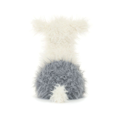 Hvid og grå hunde bamse med pjusket pels.
