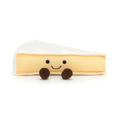 Brieformet bamse med sødt smil og små ben.