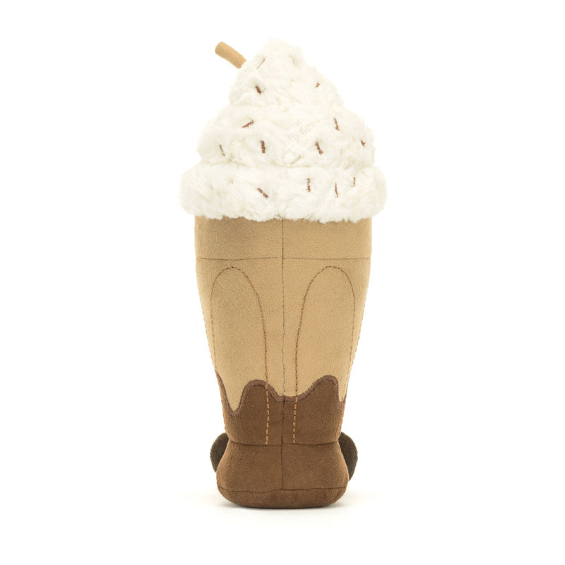 Jellycat bamse formet som en chokolade milkshake med flødeskum og kirsebær på toppen.