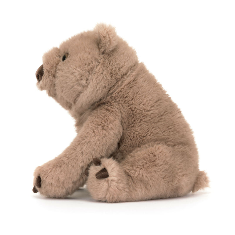 Nuttet Wombat fra Jellycat med et roligt udtryk.