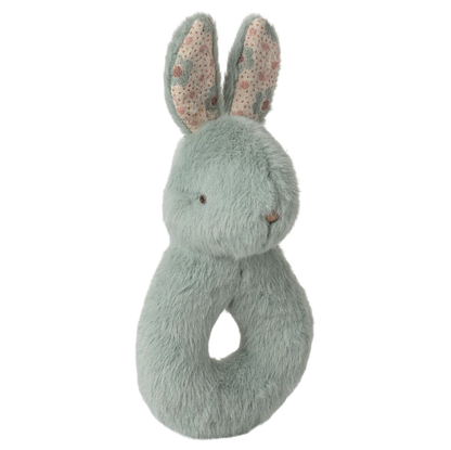 Gaveæske med mintgrøn hare-rangle og en blomstret stofble.