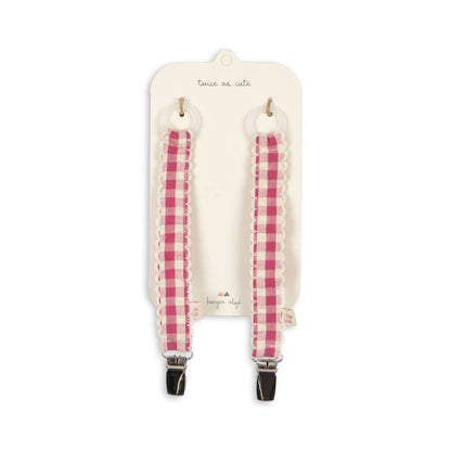 Suttesnor med pink ternet mønster.