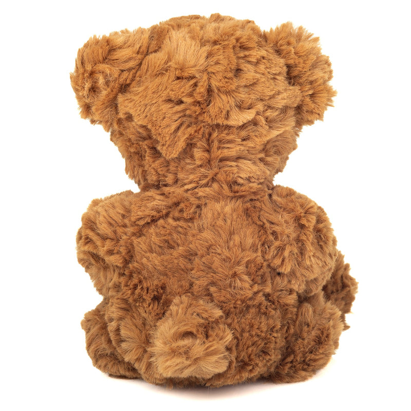 Brun bamse med rødt hjerte.