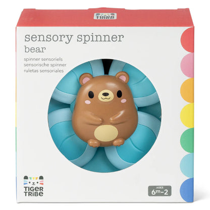 Blå spinner med bjørn og sugekop bagpå.