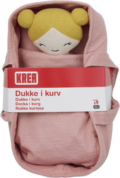 Dukke i kurv.