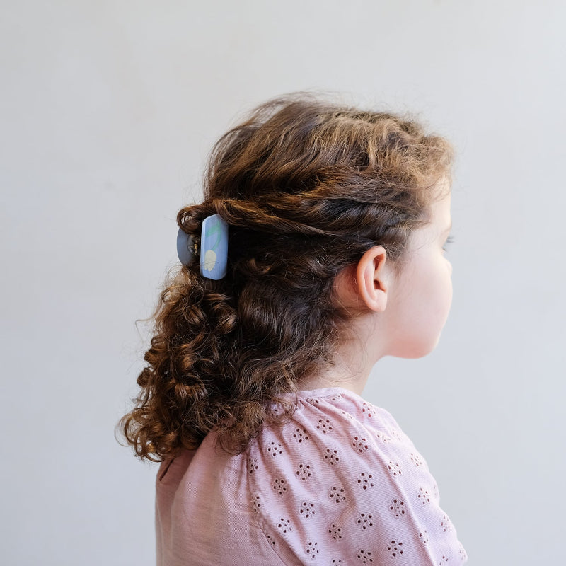 Hårklemmer med blomster.