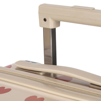 Beige kuffert med hjerte print i flere farver.